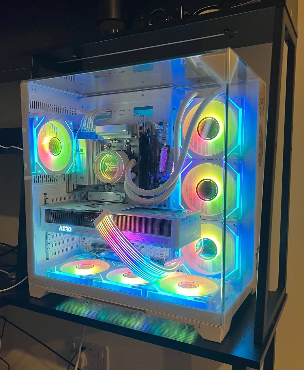 White gaming PC with liquid cooling and RGB lighting, built by ForgePC
