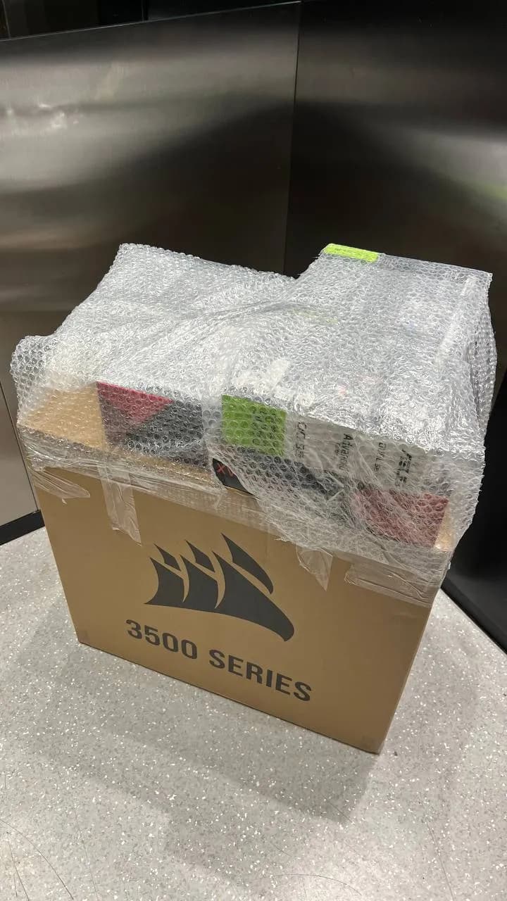 A finished PC part wrapped in protective packaging, ready to ship
